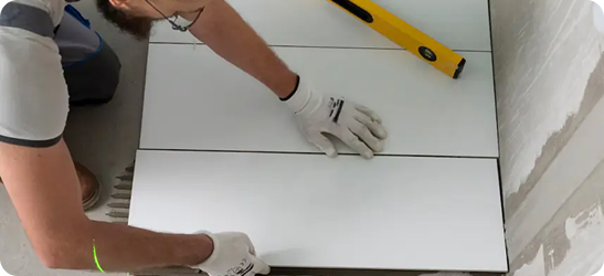 Professional tiler at work